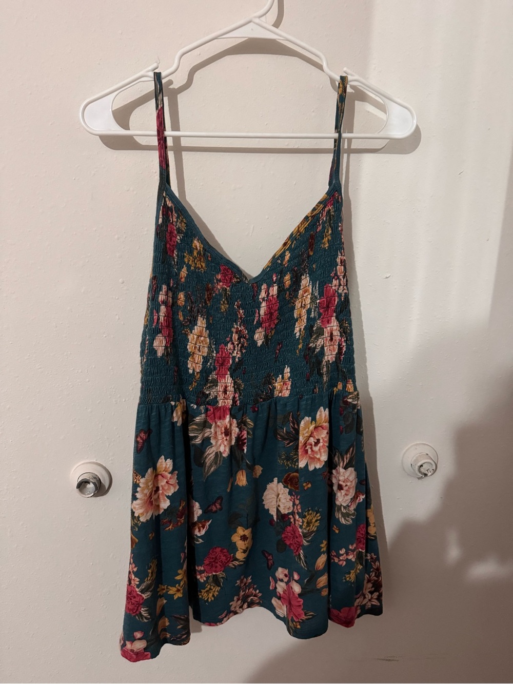 Torrid Green Floral Smocked Babydoll Top with adjustable straps.